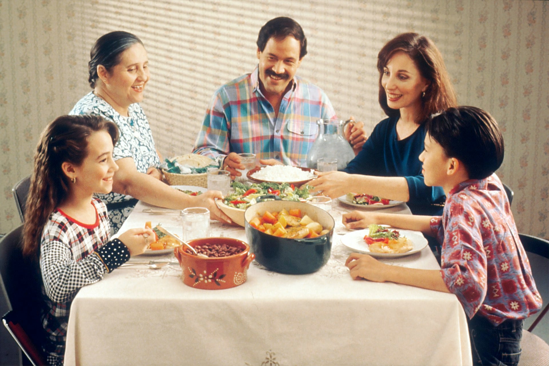 Multigenerational family gathered around a holiday table